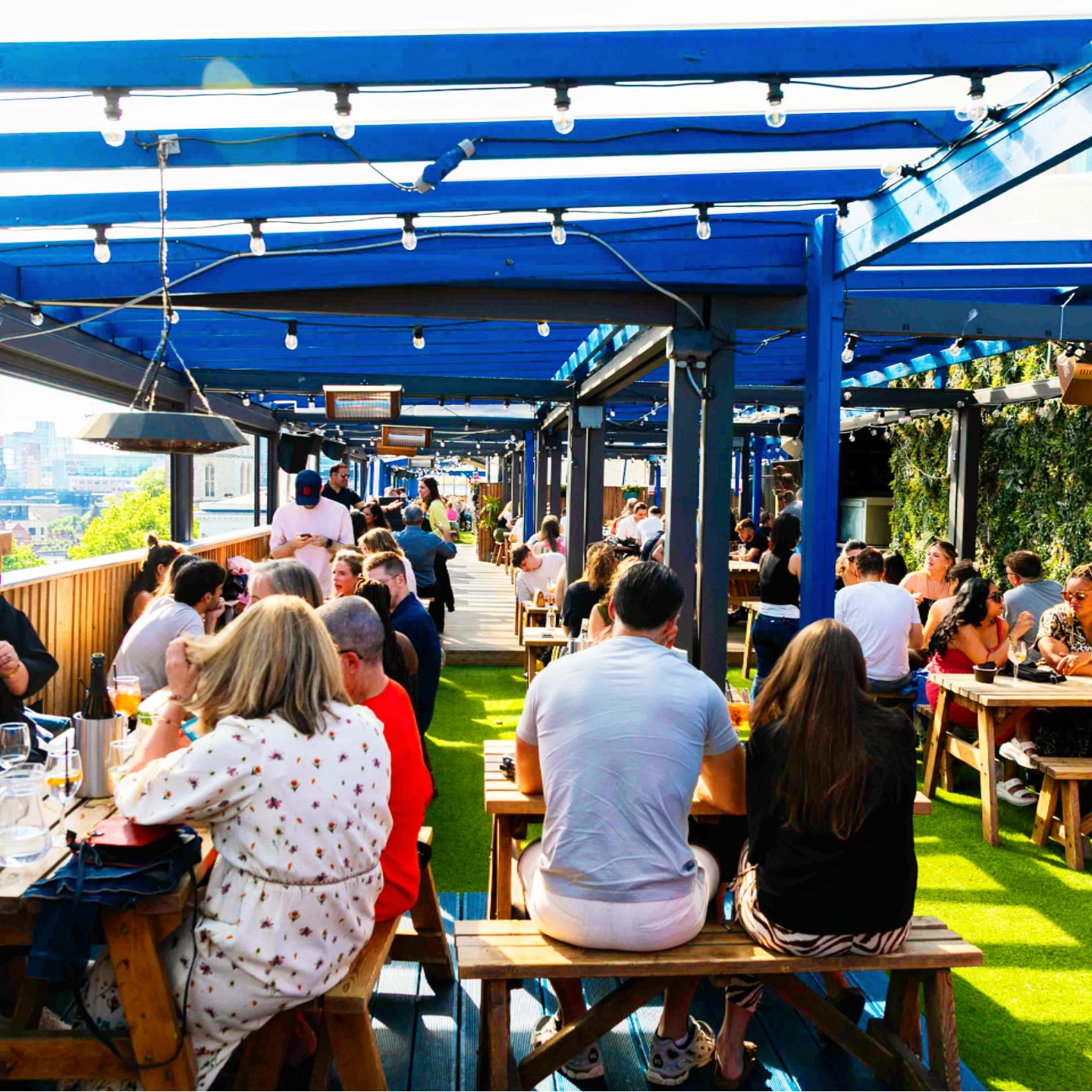 Busy rooftop terrace at London Bridge Rooftop