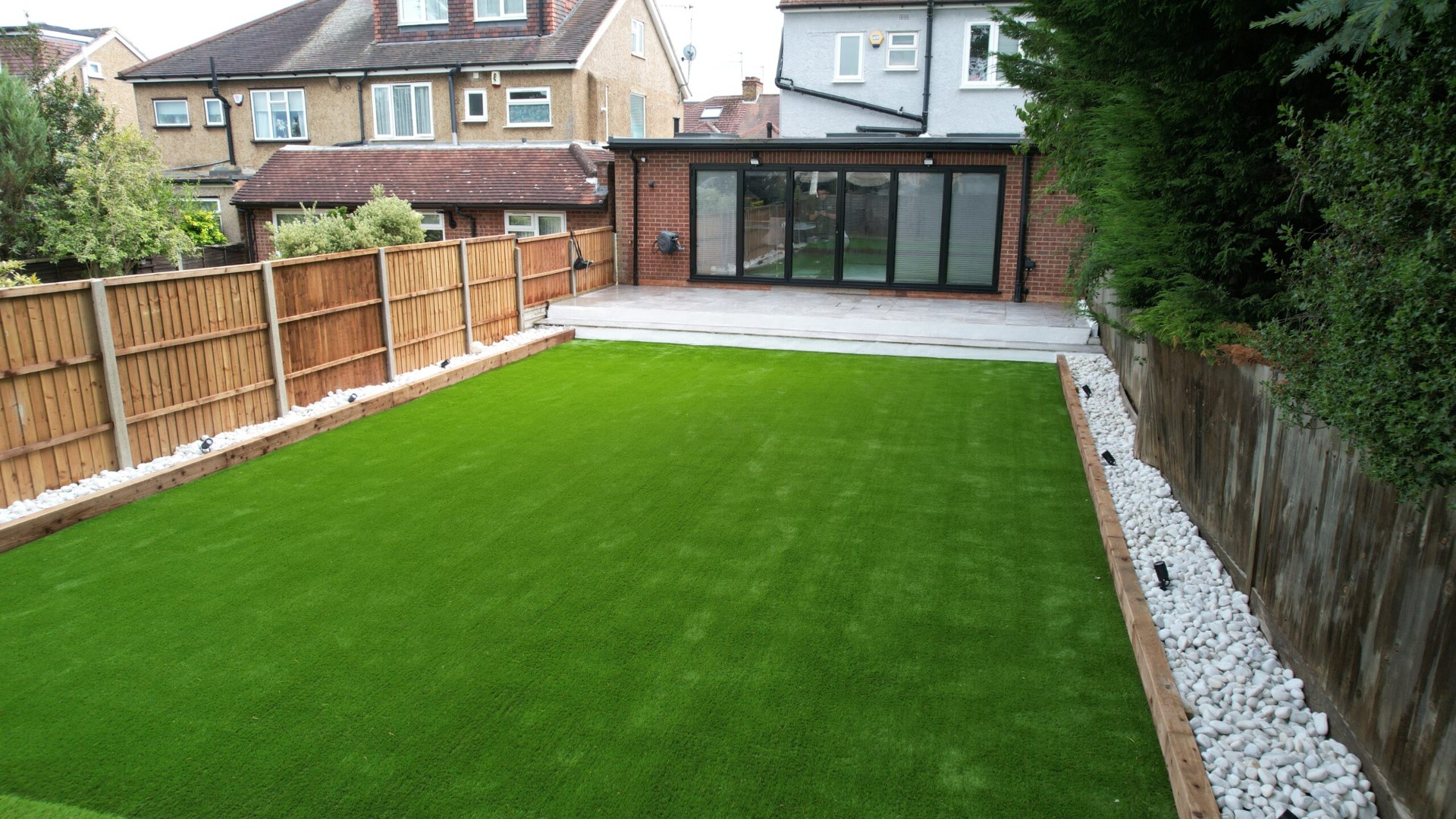 Modern patio garden in Enfield