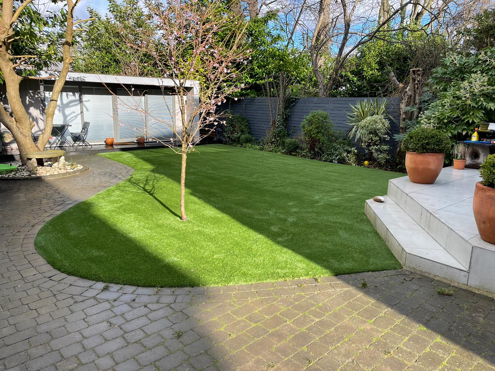 Mature garden with cherry tree in Epsom