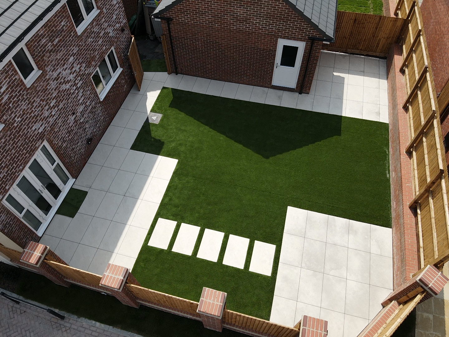 Modern patio with stepping stones in Houghton Regis