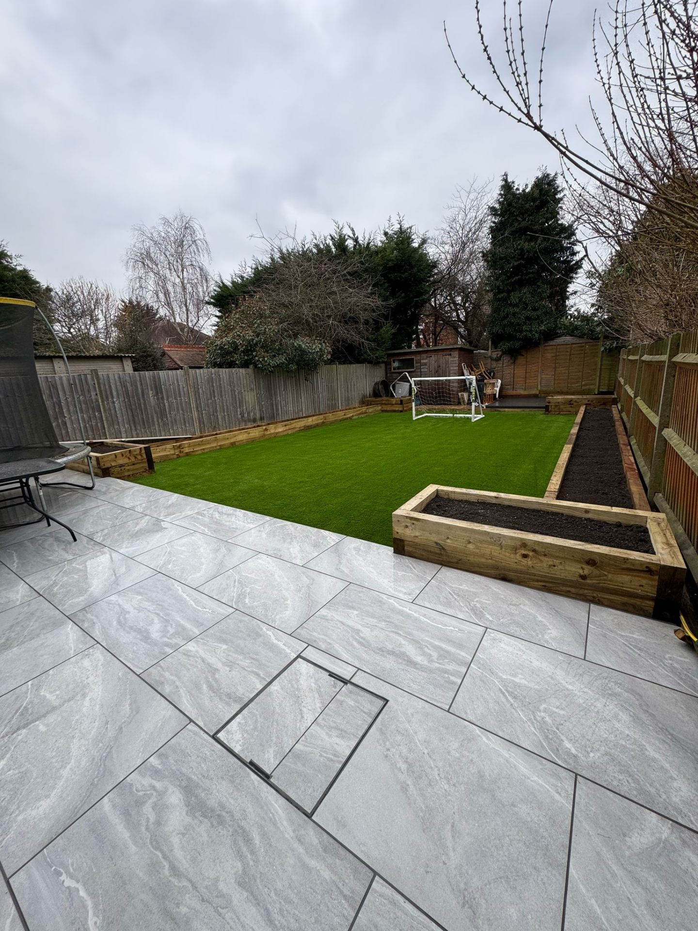 Landscaped garden with planters in Kingston
